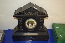 19th Century black slate clock with carved decoration