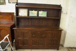 Early 20th Century oak dresser cabinet with two shelf back over a base with three doors and a single
