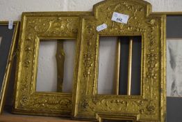 Two similar gilt metal Repousee picture frames