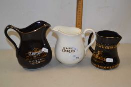 Three assorted whisky jugs
