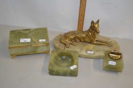 Group of onyx wares, cigarette box, lighter, model of a dog on oval onyx base