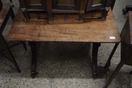 19th Century mahogany side table raised on claw feet with turned stretcher, width approx 85cm