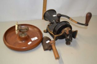 Model of a ships steering wheel mounted on a wooden circular base together with a vintage food mixer