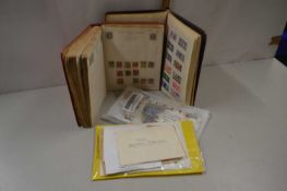 Two stamp albums and a quantity of stamps