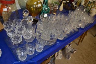 Extensive quantity of crystal glass ware including vases, fruit bowls, wine glasses, champagne