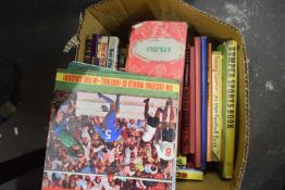 Assortment of soccer annuals and other books