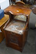 An Edwardian coal skuttle with mirror back and marble top and shelf