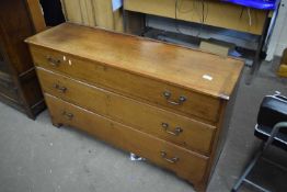 A faux drawer fronted coffer with single drawer below