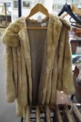 Lady's camel coloured fur coat