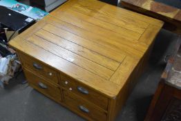 Square storage coffee table with four drawers