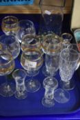 Selection of assorted drinking glasses and a glass vase