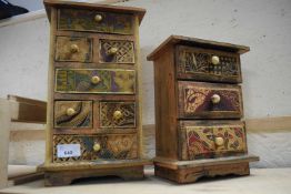 Two miniature chests of drawers