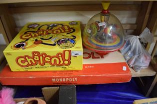 Quantity of assorted children's toys to include Monopoly, a spinning top and others