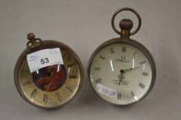 Two reproduction bulls eye type desk clocks, one marked 'Omega'