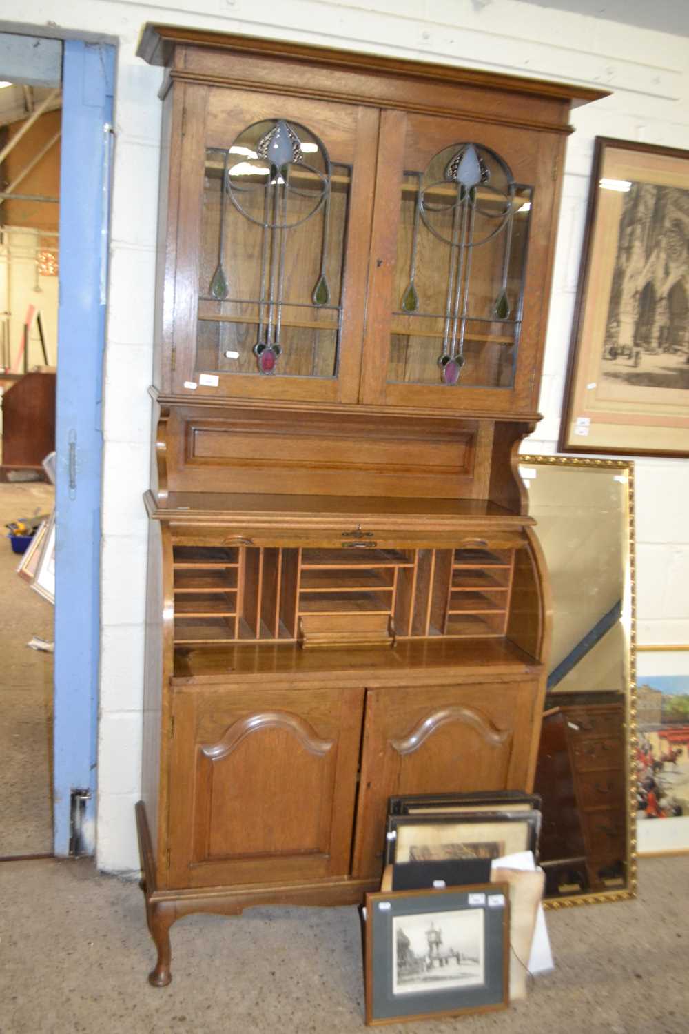 Late 19th/early 19th century oak bureau bookcase cabinet, the top section with Art Nouveau type lead