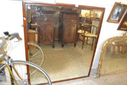 Large early 20th century rectangular bevelled wall mirror in hardwood frame