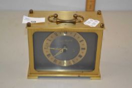 Brass cased clock by The London Clock Co