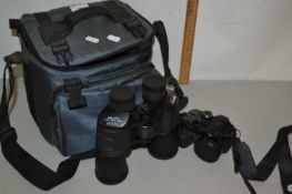 GE digital camera together with a pair of Blackbook binoculars