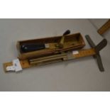 Mixed Lot comprising a dressmakers gauge and a further tool