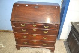 Georgian mahogany bureau with fitted interior over a four drawer base and bracket feet