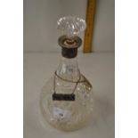 Silver mounted decanter with label