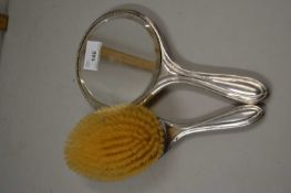 Silver backed dressing table brush and mirror
