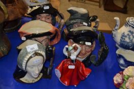 Five Royal Doulton character jugs together with a Royal Doulton figurine