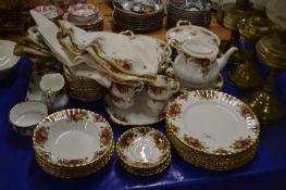 Quantity of Royal Albert Old Country Rose table wares and accompanying napkins and table cloth