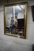 Modern bevelled gilt framed wall mirror