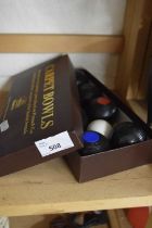 Set of boxed carpet bowls