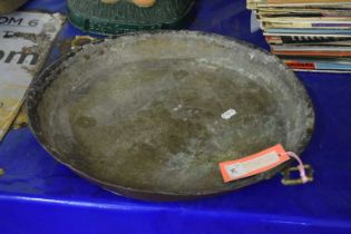 Vintage copper pan with fish decoration