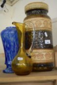 Large pottery vase together with a marbled glass vase and a yellow glass ewer