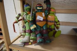 Four Teenage Mutant Ninja Turtle dolls