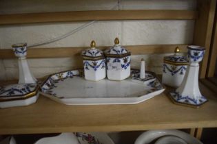 Blue and white and gilt decorated dressing table set comprising tray, candlesticks, pin dishes etc