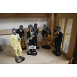 Six resin figures of a jazz band