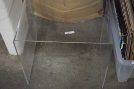 Clear plastic coffee table