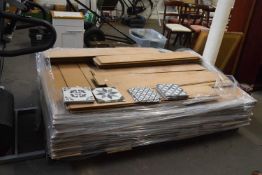 Pallet of various laminate flooring and tiles