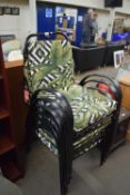 Set of six metal framed garden chairs with floral cushions