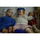 Three dolls