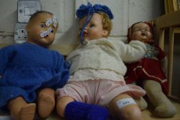 Three dolls