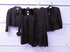 Four items of lady's black clothing, to include a Viyella faux fur trimmed coatigan, a Jaeger