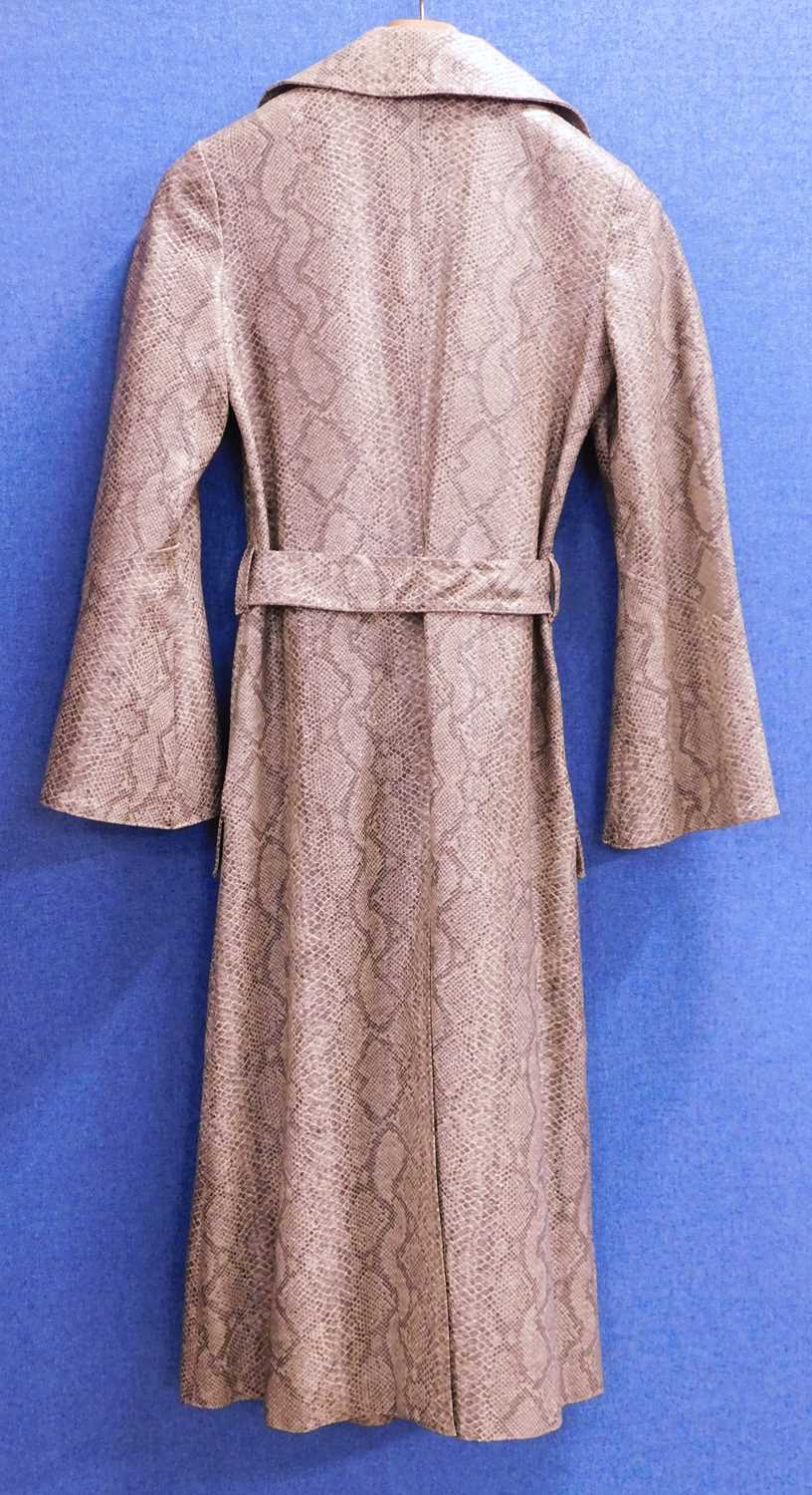 A c.1960's faux snakeskin trenchcoat by Donatella Boutique, France, single breasted with bell - Image 2 of 5
