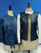 Two leather jackets, one black and cream biker style jacket with zip front, cuffs and pockets by