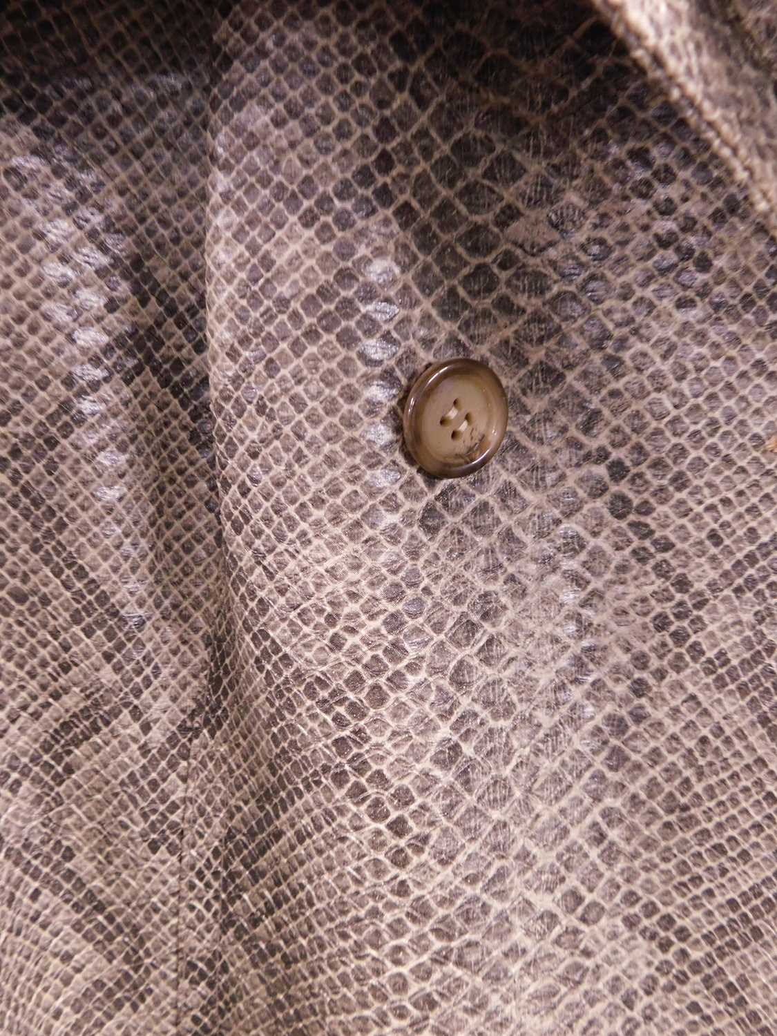 A c.1960's faux snakeskin trenchcoat by Donatella Boutique, France, single breasted with bell - Image 4 of 5
