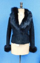 A lady's black suede and sheepskin jacket by Artigiano, single breasted with turn-up cuffs and fur