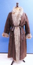 A brown faux fur coat by 'Et Dieu Crea La Femme' coat, 3/4 length open fronted with brown faux suede