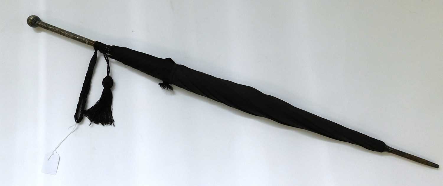 A lady's silver handled black umbrella, handle hallmarked Birmingham 1901 a little thin in places,