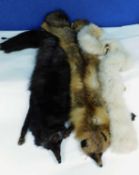 Two fox fur stoles and a cream fur scarf (3)