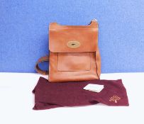 A tan leather Mulberry cross-body handbag, serial number 1976685, approx 26cm wide with original