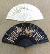 Two fans: to include a mother-of-pearl handled and floral silk embroidered fan and an Eastern
